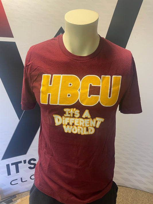 Maroon shirt yellow and white lettering